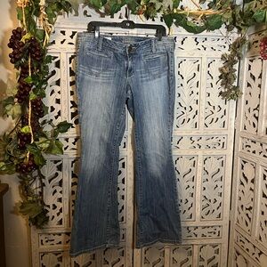 DECREE DARING FADED BLUE WASH FLARE LEG STYLE WITH DECO POCKETS LOW RISE JEANS